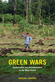 Book cover of man in forest holding machete, Green Wars in yellow text